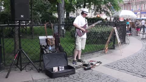 Street musician playing rock