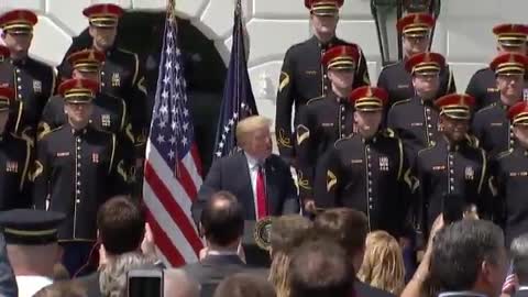 Heckler yells at President Trump during a White House event