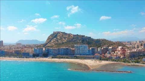 aerial view on the city against the sea with a view of the mountain and fortress alicante spain