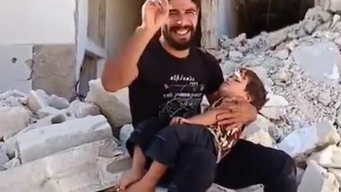 A Palestinian father is crying about his “dead” child. He forgot to tell his child not