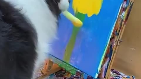 Incredibly Talented Aussie Dog Paints A Flower Onto Canvas