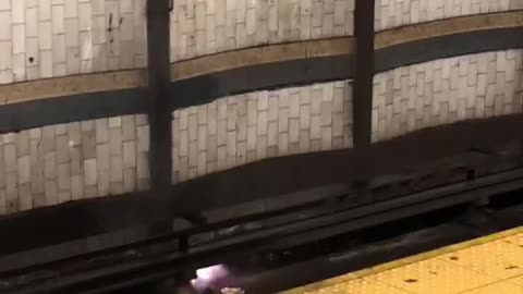 Putting out fire on subway tracks