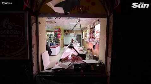 Shelling damages stores in Donetsk as Russian leader blames Ukraine