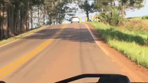 Car Zig Zags Between Lane and Ditch