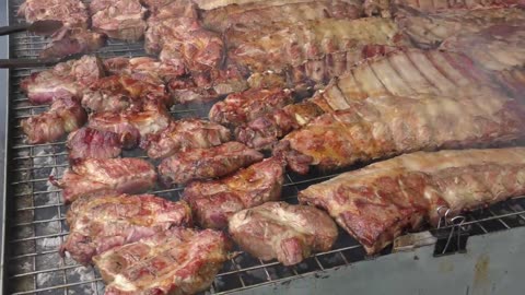 Huge Blocks of Angus Meat, Steaks, Ribs, Sausages. Argentina Street Food @ Biker Fest, Lignano