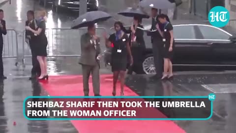 Pak PM 'Pulls' Umbrella From Woman Officer in France; She Is Drenched In Rain | PAK VS US