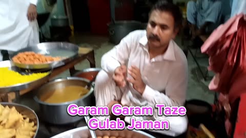 sweet shop in street - this is pakistan street sweet shop - fresh sweets - sampsa - gulab jamun