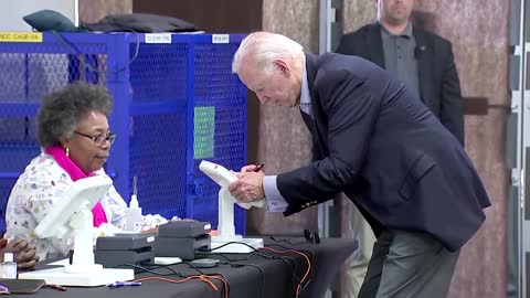 Biden casts early vote, hits out at 'stop the steal'