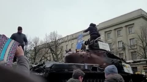 Germans throwing away the Ukrop flag off the tank. Support taking a turn...