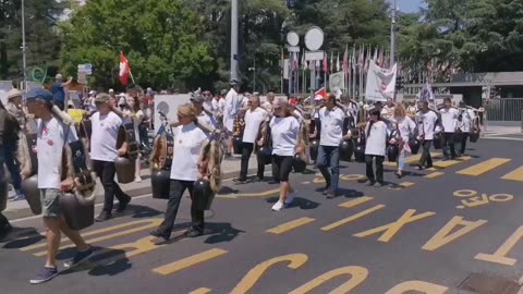 The Swiss freedom clock ringers have arrived outside the WHO to protest the pandemic treaty.