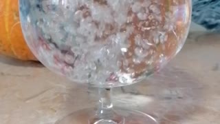 Time lapse shot of water in a glass