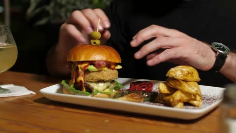 Man eating a hamburger