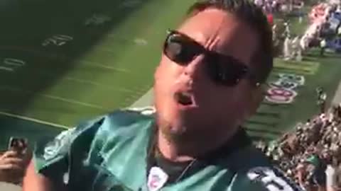 Eagles fan takes shirt off after field goal