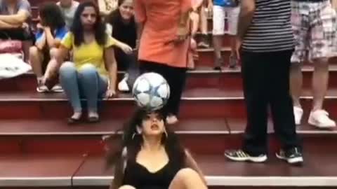 Women in high heels perform fancy football