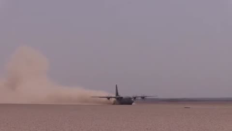 US Special Forces prepare a dirt landing strip on Dirt bike for the biggest plane