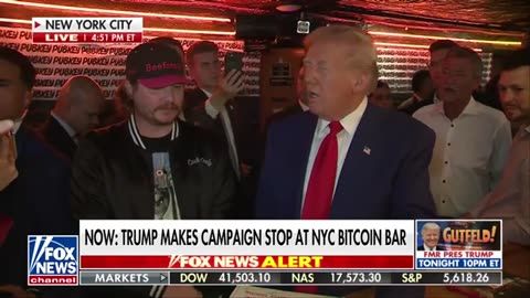 Watch_ Trump makes transaction with Bitcoin at NYC bar