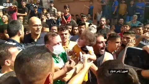 Israel Gaza war- A young girl is rescued after a strike on a residential area in Rafah