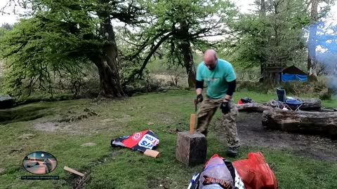 Cooking on a campfire next to a river while wildcamping