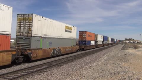 Intermodal and Coal Train Race Through Wyoming's Powder River Basin