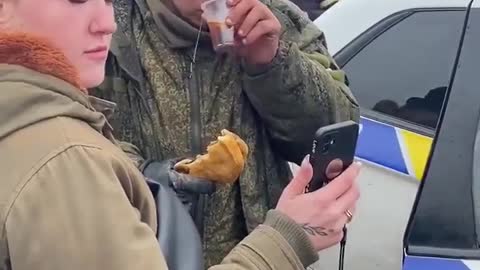 A Russian soldier surrendered. Ukrainians gave him tea, food, and let him call his mother on video.