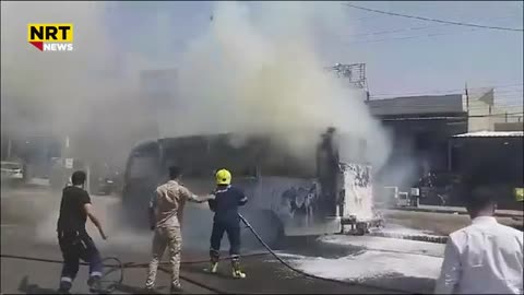 A bus caught fire in front of the Kirkuk Cultural Center