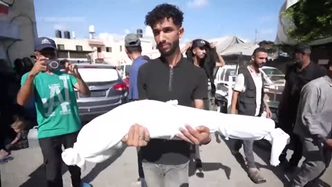 Funeral prayers held for man and three daughters killed in Israeli bombardment of central Gaza.mp4