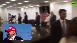 Trump notices the photographer who took the iconic shot of the assassination attempt