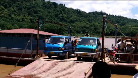 A ferry crossing the Mekong River, in Lao, imagine doing this every day