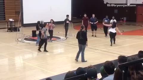 Dance circle gym guy flips friend over back