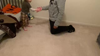 Son and daddy handshake