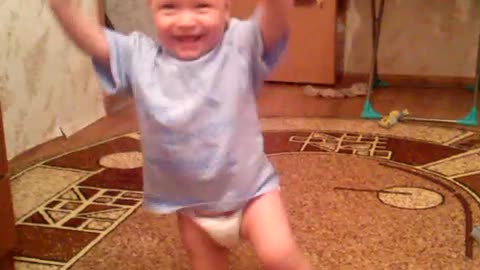 funny baby learns to walk