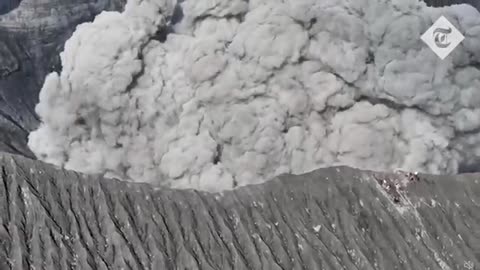 Moment climbers run for their lives as volcano erupts in Indonesia