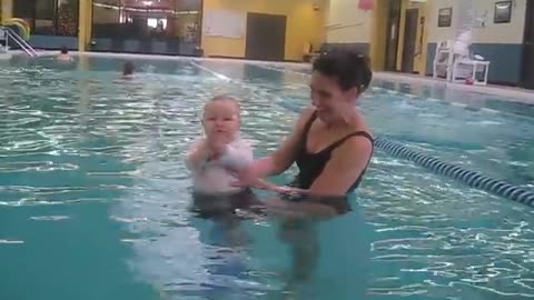 5th week Infant swim lesson fully clothed- 9 months old- Learn to Float