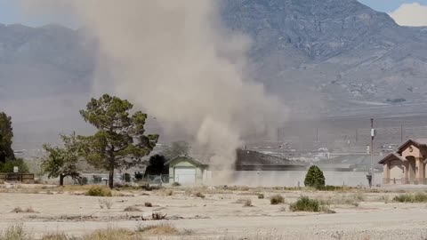 Huge Dust Devil Dissipates Over House