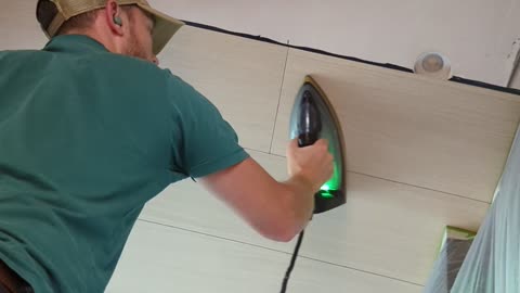 Wood veneering a ceiling