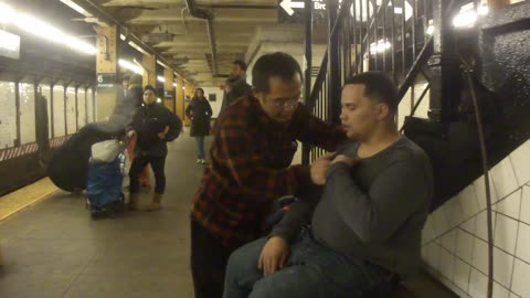 Luodong Massages Young Man In Subway Station