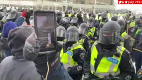 Unfazed By Police Presence, Protesters in Ottawa Sing Their Beloved National Anthem