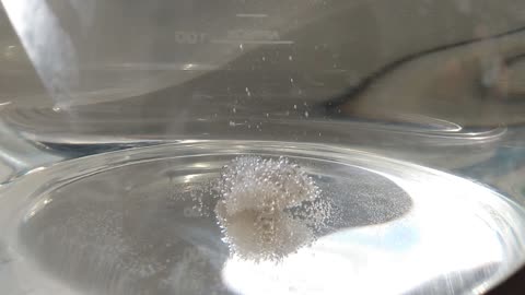 Solid pure phosphoric acid into basic solution.