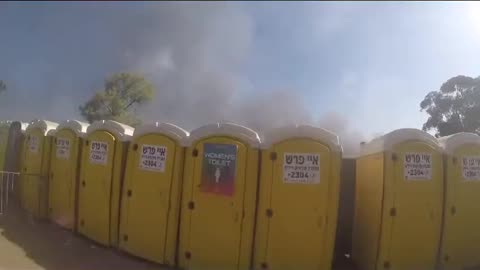 Hamas terrorists indiscriminately shoot at bathrooms during the Nova Music Festival.