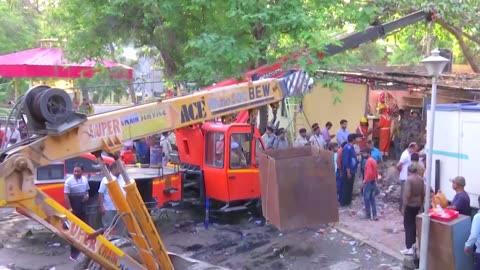 At least 35 dead in India stepwell roof collapse