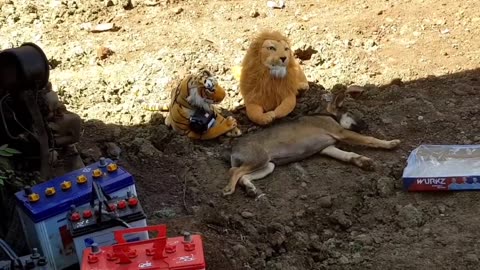 Fake lion and fake tiger prank to real dogs so funny video not try to laugh