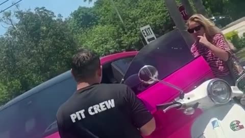 Fuming driver confronts stranger breaking into luxury sports car to pose for SELFIES