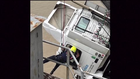 Terrifying Moment Truck Drives Over Bridge