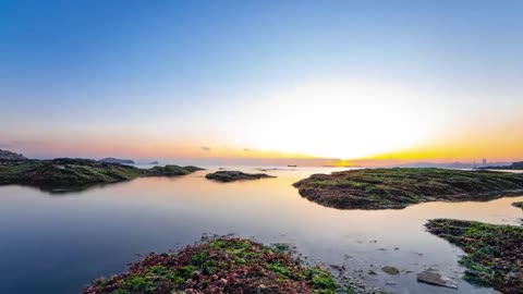 Coastal sunrise sunset delay reef beach