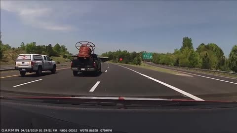 Following truck didn't have load tied down giant spool falls out truck at 65 MPH