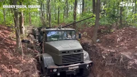 Ukrainian soldiers patrol & secure trenches around Kharkiv