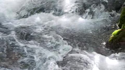 The Roaring Sound of Water in a River