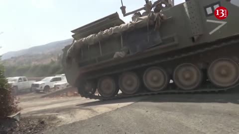 Israeli tanks deploy at the border with Lebanon