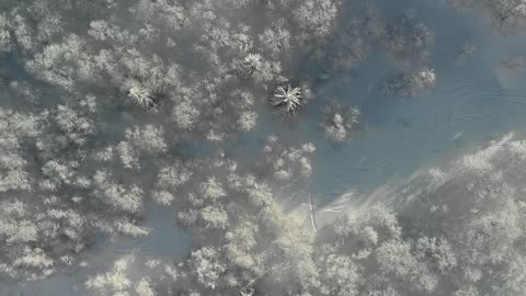 Ski Marks On The Snow Covered Mountain Slopes