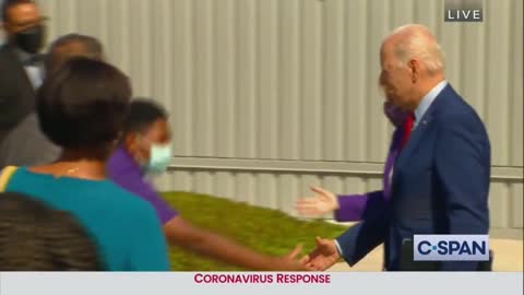 Maskless Biden approaches school child as everyone else around him wears a mask